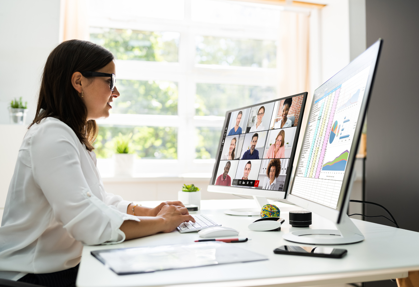 Woman leading a webinar for a group of online participants