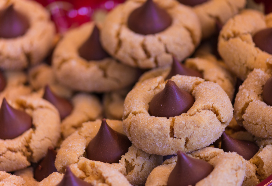 A stack of peanut butter Kiss cookies